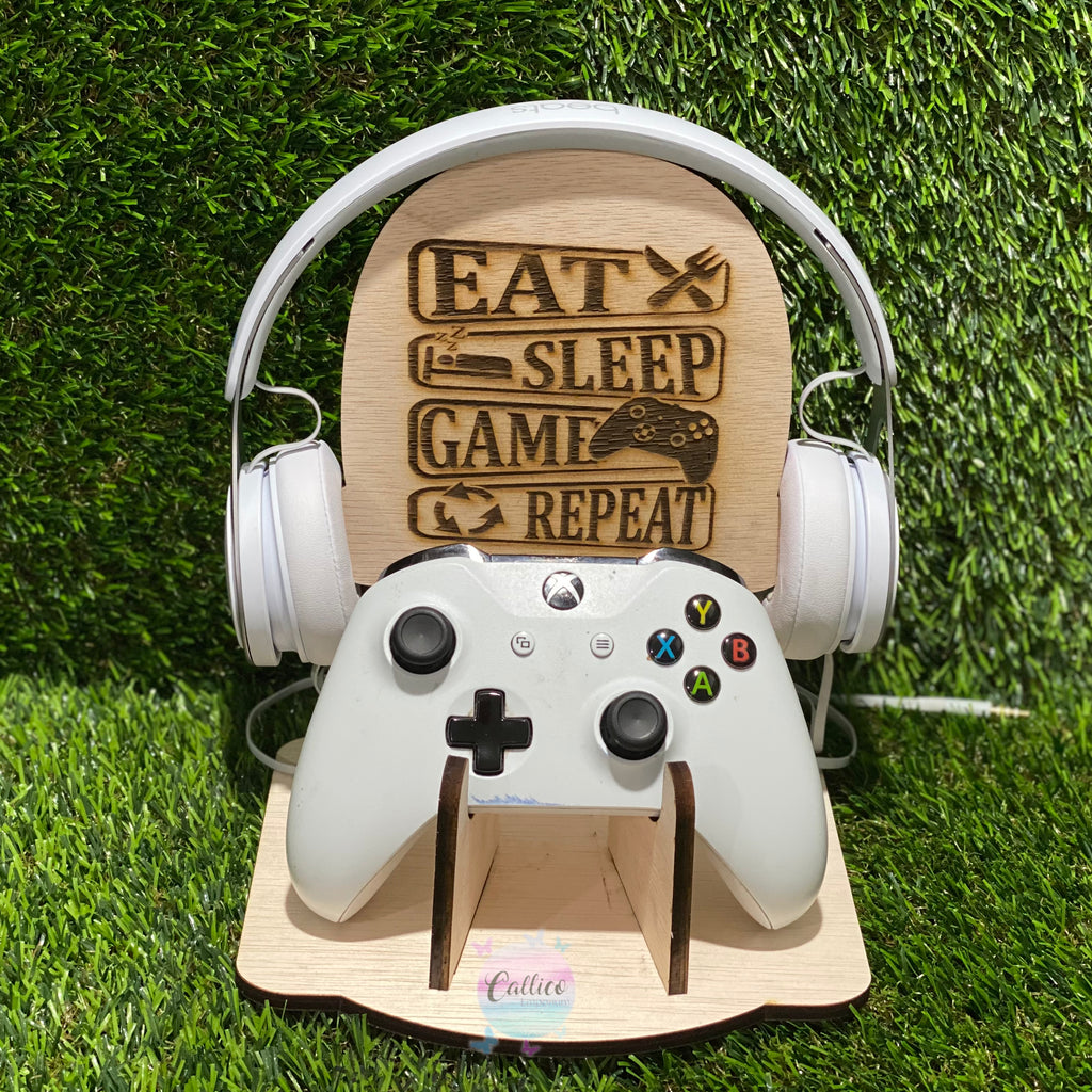 “Eat Sleep Game Repeat” Gamer Stand